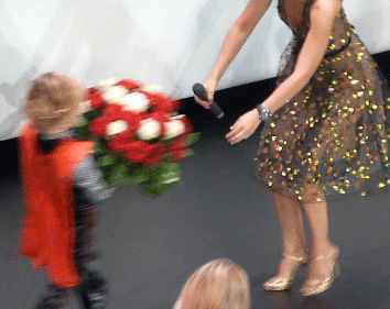tallythor:  a-tongue-is-like-a-sharp-knife:   As Chris couldn’t make it tonight, he prepared you, Natalie, a little surprise.  “Thor : The Dark World” premiere in Paris on Oct 23rd 2013 (taken by me)  Which begs the question, who is that
