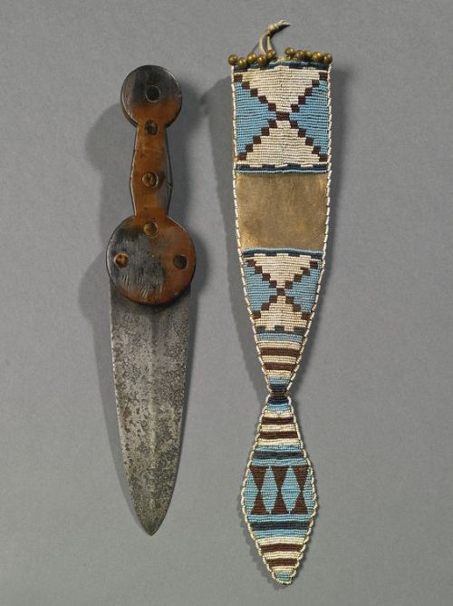 Blackfoot dagger with beaded hide sheath, 19th century.from Sotheby’s