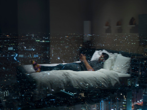 unrar:Tokyo. 2015. A self-portrait of Alec Soth in his hotel room at the Park Hyatt Hotel, where Los