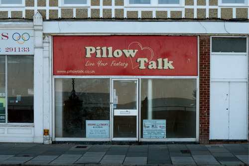 thessalian:  disease: A collection of bizarre shops throughout England, photographed by leon S-D. It amazes me that people think this is weird and to me it’s just “My commute home in an economy held together with spit and baling wire”. 