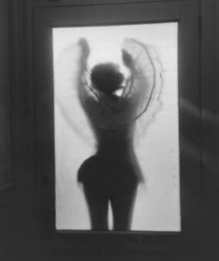 Porn Pics Girl in crinoline skirt through frosted glass