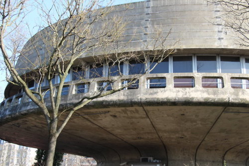 sosbrutalism:Just like the one from yesterday, ufo-like shaped buildings have always something speci