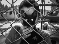 semioticapocalypse:  Arek Rataj. Cat’s Eyes. San Pedro Sula, Honduras. 2012  [::SemAp Twitter || SemAp::]