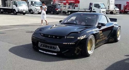 vagina-tickler:  stancedautos:  The real life end result of the renderings  I still dislike rocket bunny cars but damn the rear overs go really well on the fd the rest of the kit looks like poop still, front bumper makes the car look like it has a stupid