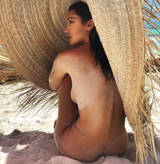 Hot Model Bella Hadid Swimsuit & Topless Photos Bella Hadid goes to the beach to run around in the sand in her swimsuit and she looks like she is having fun as she is shaking her ass cheeks in front of the camera. She then removes her swimsuit and