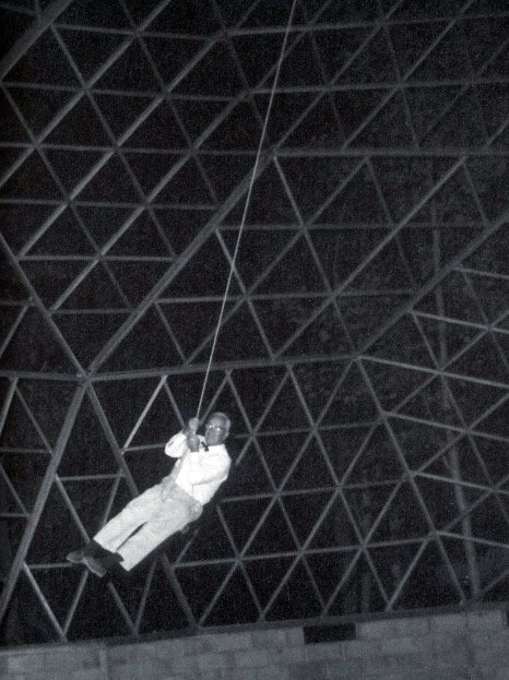 less-ismore:Buckminster Fuller swinging from the Woods Hole dome in 1955, while it was still under c