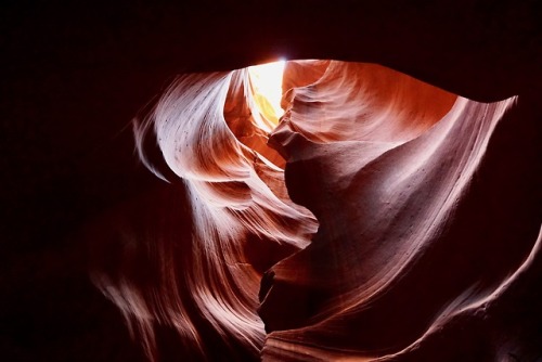 feet-of-clay:Overhead light through stone clouds.