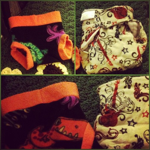 Dinosaur fleece cover and guitar print fitted! :). #clothdiaper
