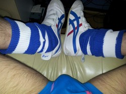 Men in rugby and footy socks