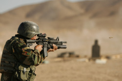 Militaryarmament:  An Afghan Commando With The 9Th Commando Kandak, Moves Toward