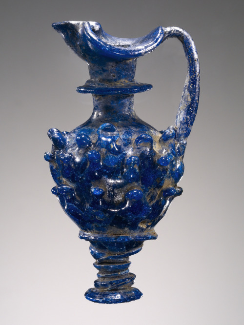 didoofcarthage:Core-formed dark blue small oinochoe (wine jug). Etruscan, 7th century B.C. Glass. J.