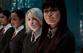 elevensickles:The Ravenclaw team, dressed in blue, were already standing in the middle of the field.