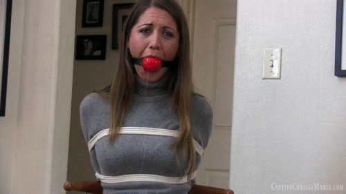 sensualhumiliation:Nothing to do but look at the objective of the camera, while she is being filmed 