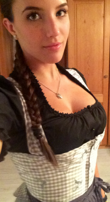 kerrigold:  Btw guys and girls.. This is a real traditional Bavarian Dirndl  Not that crap that Paris Hilton wears whenever she goes to the Oktoberfest