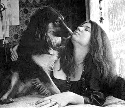 Janis with her doggy and kitty in their San Francisco apartment, photos by Baron Wolman.