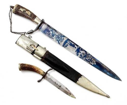 German hunting knife set with antler grips, early to mid 19th century.from Helios Auctions