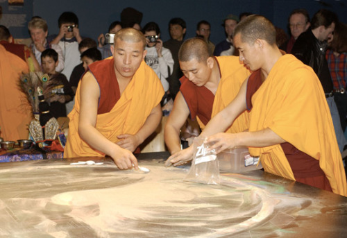 freersackler:  In response to the September 11 tragedies, twenty Buddhist monks from the Drepung Loseling Monastery constructed a sand mandala (sacred painting) at the Sackler in 2002. This seven-foot-square mandala, one of the largest ever created in