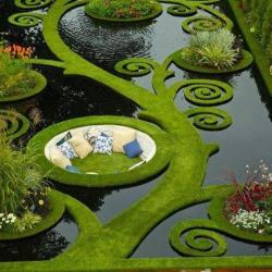 rhazade-waterbender:  yuyukami:  startwithaseed:  theblacklacedandy:  funnywildlife:  Award Winning Garden Design By Ben Hoyle  I’M SCREAMING THIS IS SO BEAUTIFUL  That sunken seating? *wets pants*  So incredibly gorgeous. I would love to curl up there