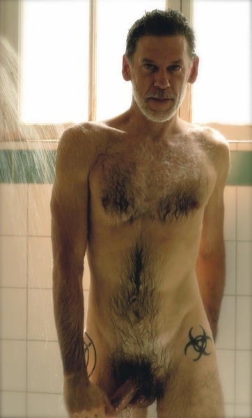meniwant2buttfuckme:  Older, hairy, grey chest hair, nice cock, biohazard tattoo…fucking hot as hell!  Time to clean up!