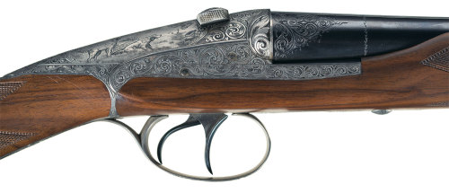 Factory engraved Darne V22 sliding breech double barrel shotgun.