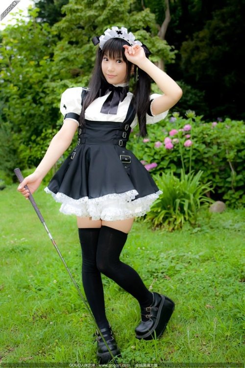 A maid that loves to play golf.