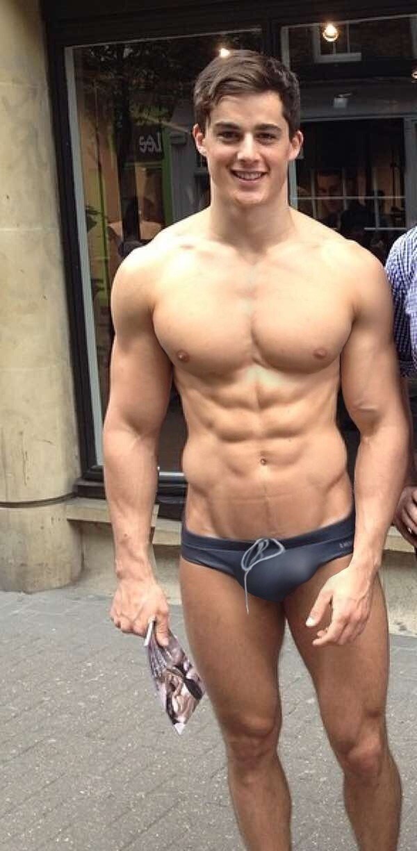 doylelee1760:  BUFFED SWIMMER SHOWS US A FULL SPEEDO