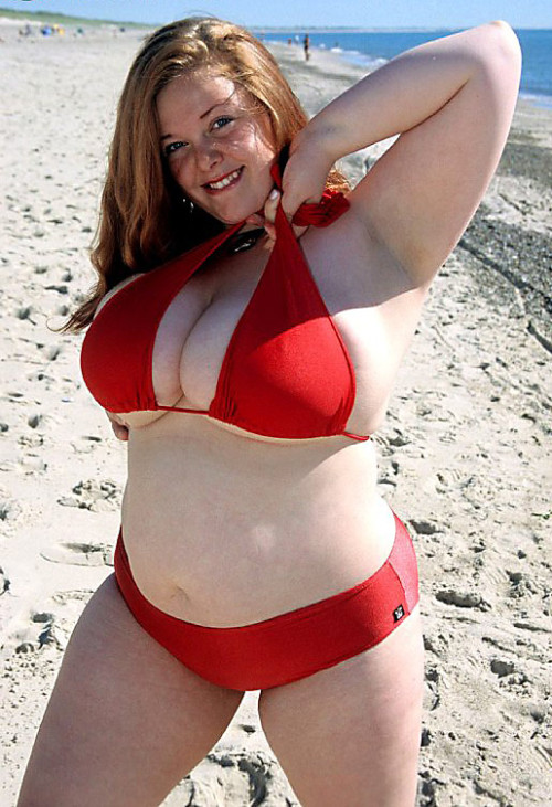 Porn photo   A fat woman in a red bikini at the beach