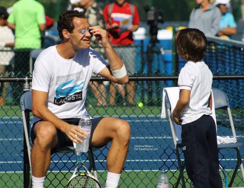 Michael Llodra playing with his son. Cincinnati 2013. [more]