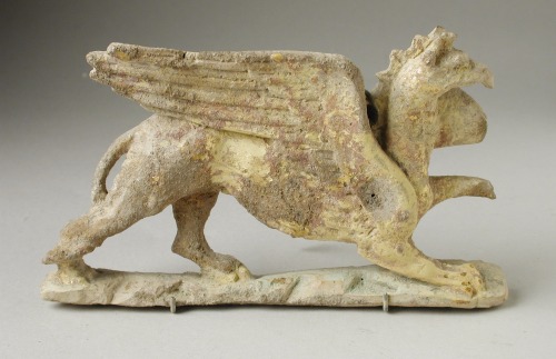 lionofchaeronea:Terracotta applique in the form of a griffin.  From Taranto (ancient Taras/Tare
