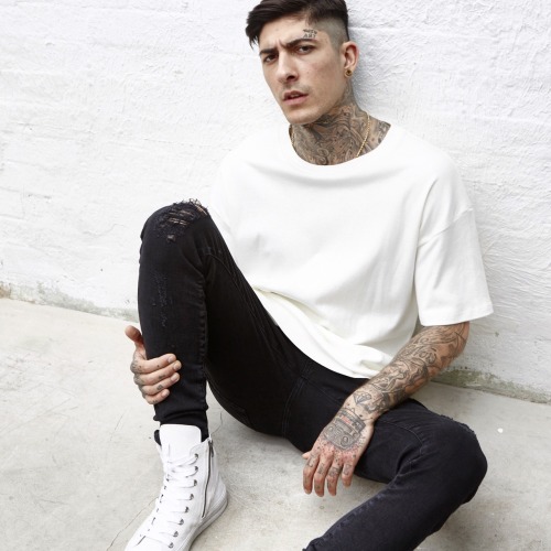 Re-invention. The black essential denim will come in a destroyed style. With hand-distressed detaili