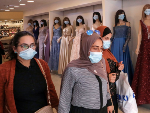 Women shop at a clothing store in Hebron, on July 27, 2020.> Photo: Hazem Bader.
