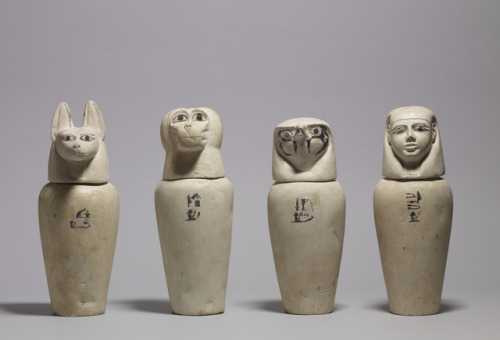 A set of four ancient Egyptian limestone canopic jars, used for holding organs removed from the dece