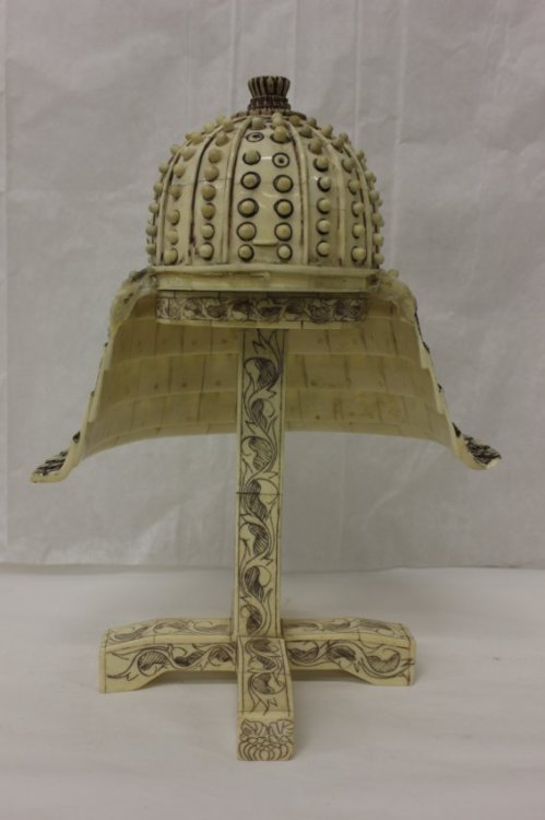 Bone carved samurai hat with stand