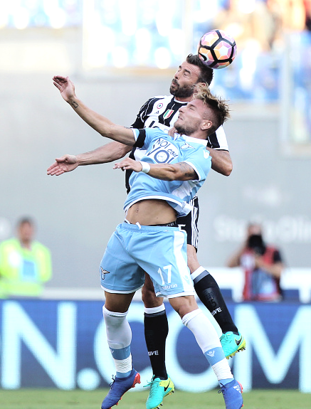 Ciro Immobile and Andrea Barzagli in S.S. Lazio vs Juventus