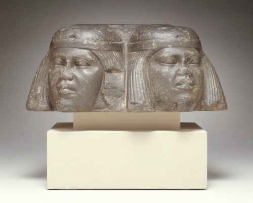 Ancient Egyptian sculpture (basalt) of the heads of prisoners.  Artist unknown; ca. 1878-1783 BCE (l