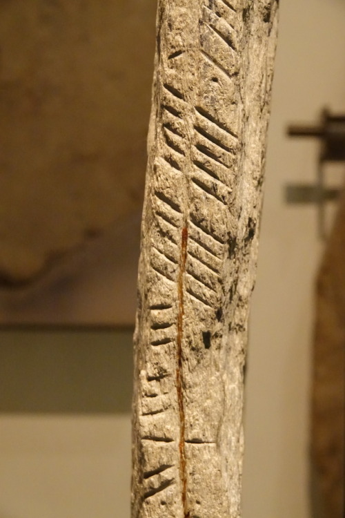 Carved Ogham Inscription on the edges of a carved Pictish and early Christian stone, national Museum