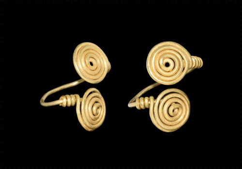 Iron Age Celtic gold double-spiral ring (shown twice above) c. 2nd century BCE to 1st century CE. Fr