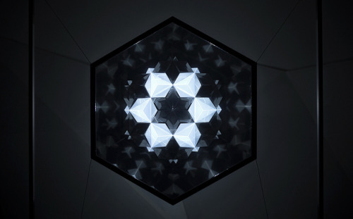 asylum-art:  Patterns of Harmony by Gaspar Battha Patterns of Harmony is a mirrored projection mapping installation inspired by quantum physics and a research to find the origin of geometry. It focuses on all of nature’s weird beauty, takes concepts