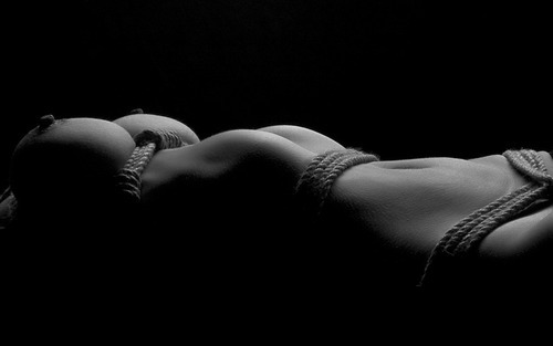 Porn photo The sensuousness of rope and bare skin is