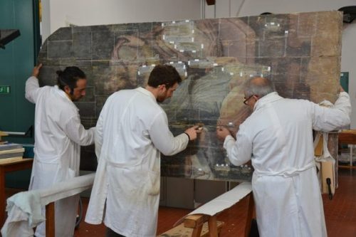 Conservators restoring Giorgio Vasari’s Last Supper (1543).The painting was catastrophically damaged