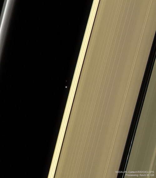 Earth and Moon through Saturn&rsquo;s RingsImage Credit: NASA, ESA, JPL-Caltech,&