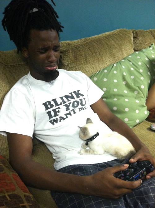 weepingangelsmiles:catsamazing:My brother’s first reaction to our kitten. Babies make all men weak.I