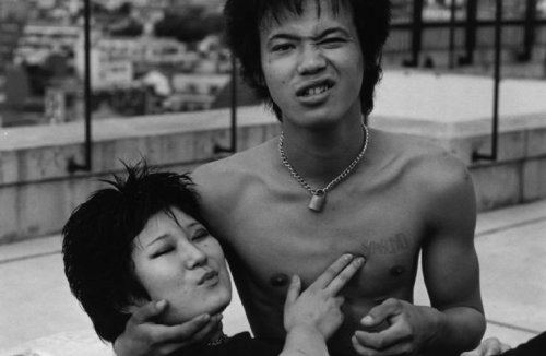 theunderestimator-2: Sign your name across my heart: punk couple captured by Rene Burri in Tokyo bac