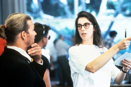 Kathryn Bigelow gives direction to Patrick Swayze on the set of Point Break.