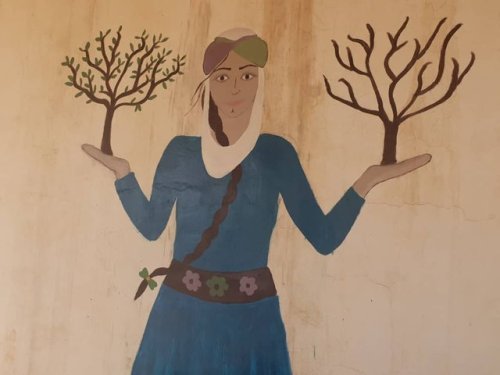 womansart:Mural by a group of women in Syria who have created a self-sustainable women-only feminist