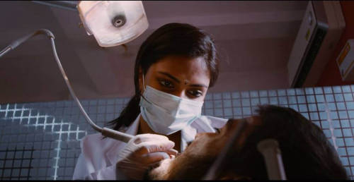 A scene from a movie, a sexy dentist.