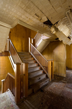 ianference:  This is the central stairwell of the Hotel Empire, one of many resort hotels in Sharon Springs, NY, that catered to the Ashkenazi Jewish population who frequented the town during its heyday as a vacation spot.  The kitchen was fully kosher