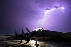 177thfw:  Eagle in the storm - Here’s a shot of a 335th Fighter Squadron F-15E Strike Eagle illuminated by a lightning strike in Afghanistan in 2011. (U.S. Air National Guard photo by Tech. Sgt. Matt Hecht) Remember, tomorrow is the Air Force/Air National