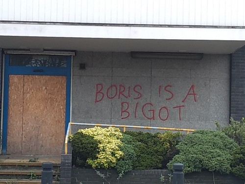 Graffiti against UK Prime Minister Boris Johnson seen on the old West End police station in Newcastl