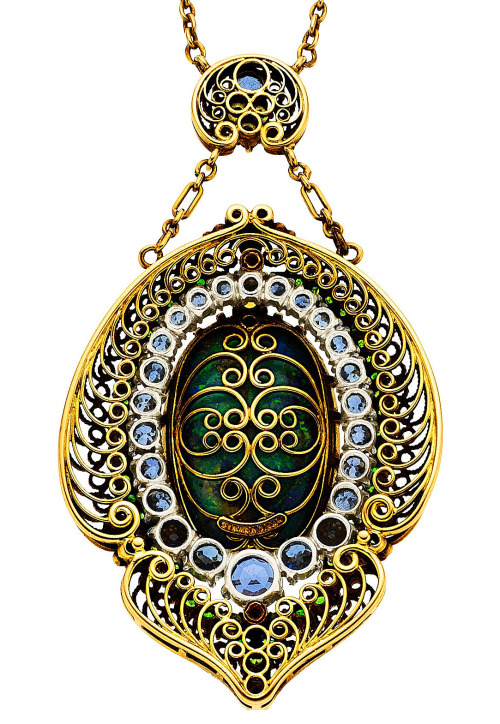 ufansius:Front (top) and rear (bottom) views; gold, black opal, sapphire, and demantoid garnet penda